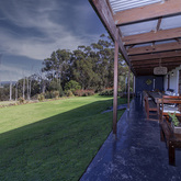 Groenvy View of Veranda- Beloftebos Farm Cottages - Xplorio™ Stanford