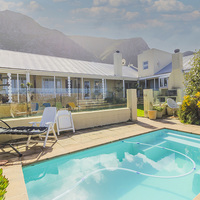 Relaxing Swimming Pool Area - Fijnbos Manor - Xplorio™ Betty's Bay